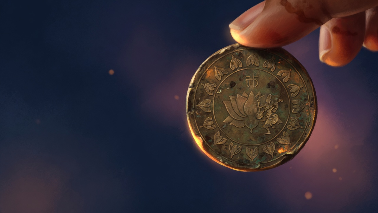 The NFC coin held in fingers: a copper token with lotus and Saraswati iconography around the rim, photographed against a dusky blue background.